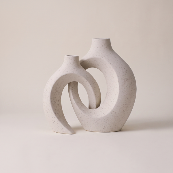 Seto pair of matte speckled ceramic ring vases, studio shot